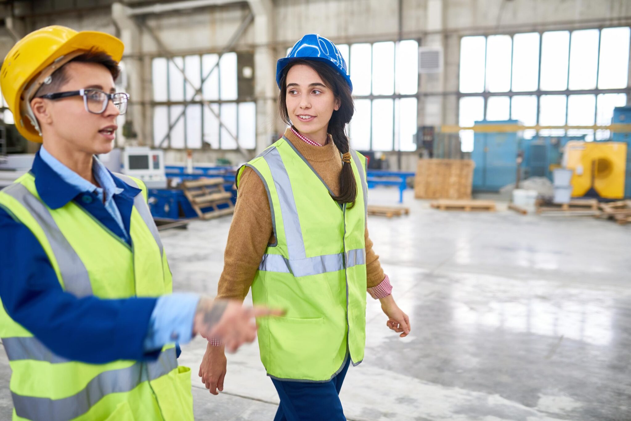 Forewoman showing construction site to new employee