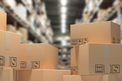 Cardboard boxes on blur storage warehouse shelves background,  Distribution, cargo and logistics concept. 3d illustration