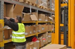 Worker Order Picking in Fulfillment Warehouse