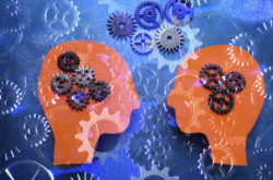 Two heads facing each other with gears background